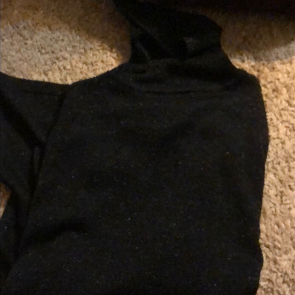Short sleeved turtle neck sweater.